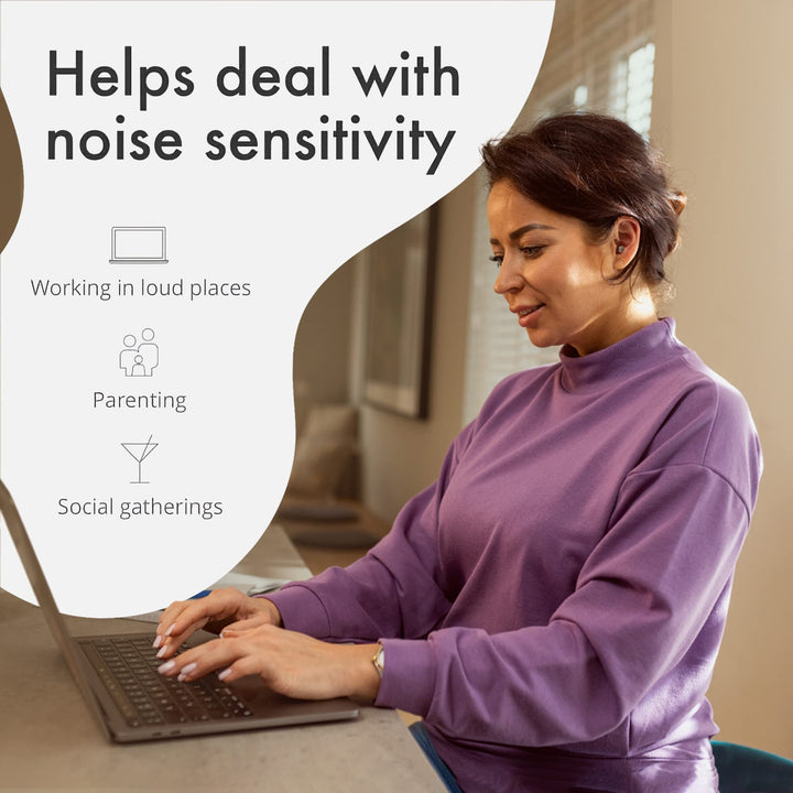 Woman using a laptop, highlighting Alpine ClearTone earplugs as a solution for noise sensitivity in work, parenting, and gatherings.