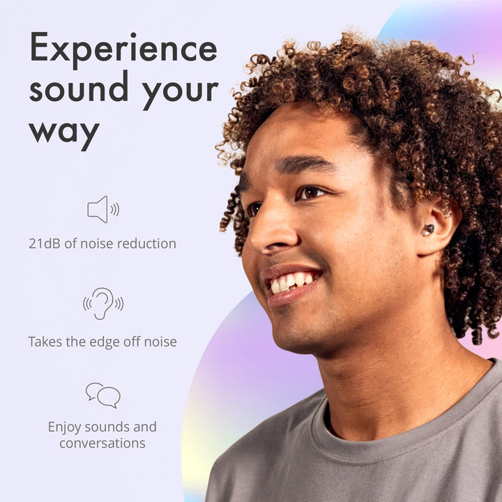 Man wearing Alpine ClearTone earplugs, showcasing 21dB noise reduction, preserving sound clarity for conversations and enjoyment.