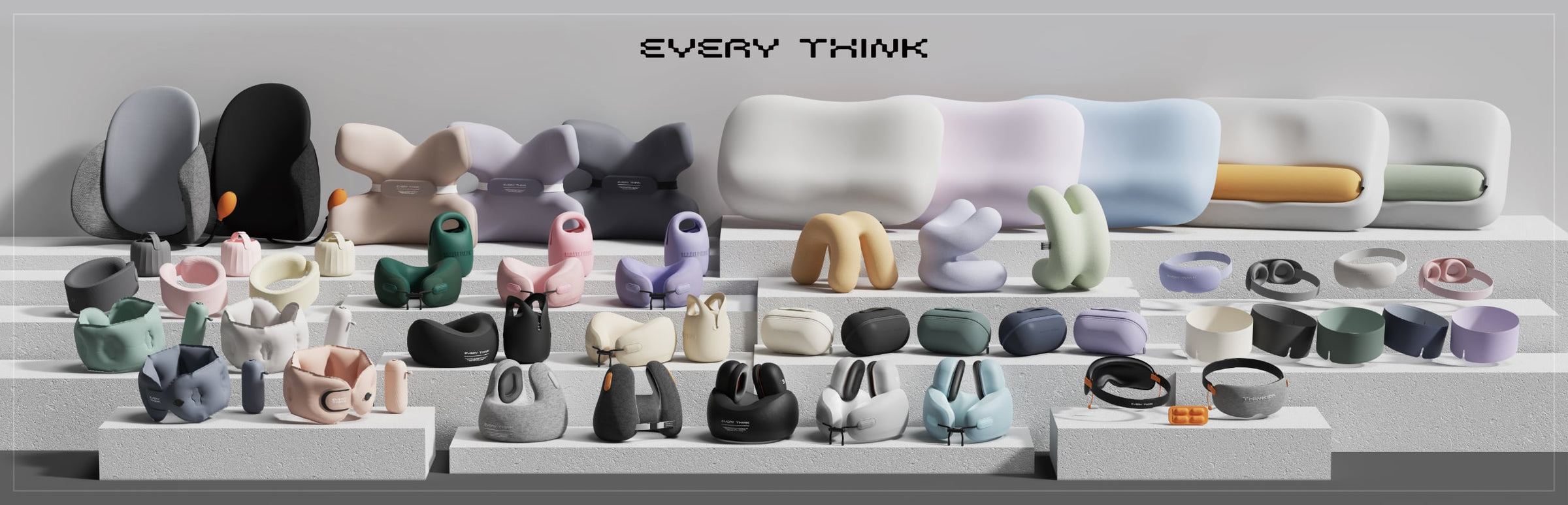 EVERYTHINK travel pillows and comfort accessories in assorted colors on display stands