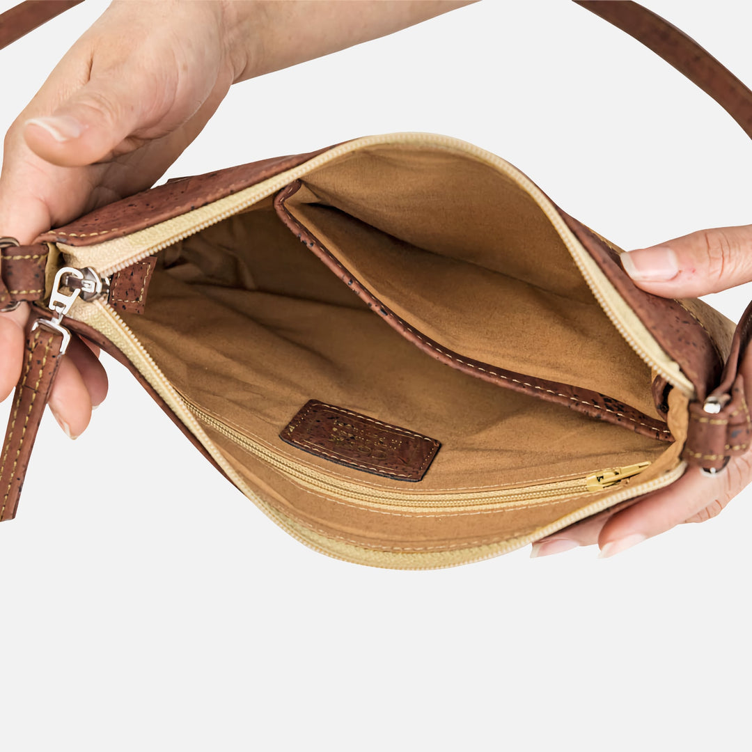 Interior view of Corkor Vegan Cork Crossbody Bag showing compartments and cotton lining