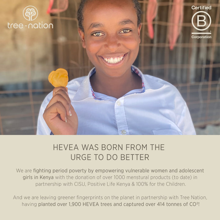 Smiling girl in Kenya holding a HEVEA product, highlighting donations and environmental impact through Tree Nation