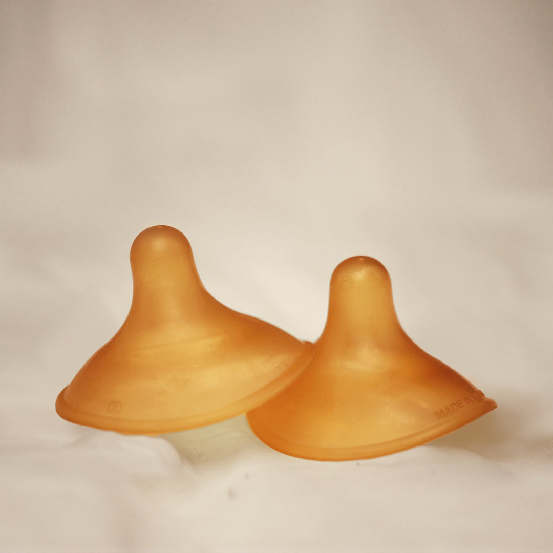 Close-up of HEVEA nipple shields, 2-pack, made from soft 100% natural rubber for breastfeeding comfort