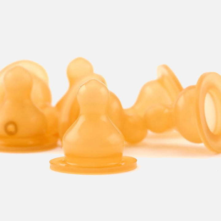 HEVEA natural rubber baby bottle nipples, soft and flexible with an anti-colic design, BPA-free and eco-friendly for safe infant feeding.