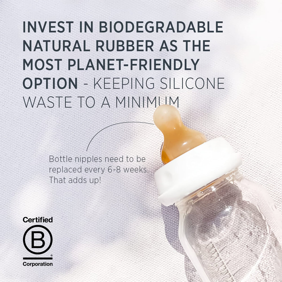 HEVEA biodegradable natural rubber baby bottle nipple on a glass bottle, an eco-friendly alternative to silicone, reducing plastic waste.