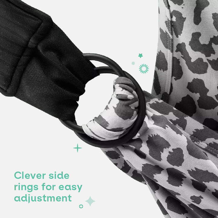 Close-up of leopard print Koala Cuddle Band 2 showing side rings for easy adjustment.