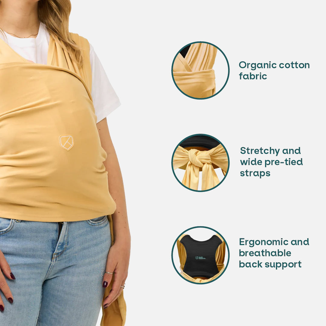 Koala Cuddle Band 2 in mustard showing features like organic cotton, pre-tied straps, and breathable back support