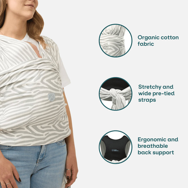Close-up of the Koala Cuddle Band 2 baby sling carrier in tiger-print gray, highlighting its organic cotton fabric, stretchy pre-tied straps, and ergonomic back support.