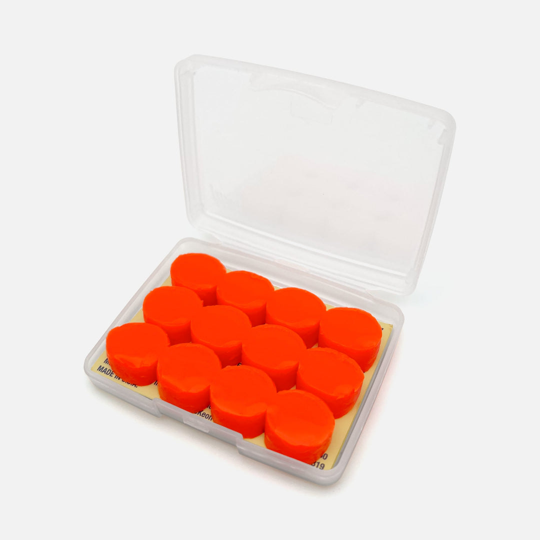 Mack's Kids Soft Silicone Earplugs in open case, 6 pairs of bright orange moldable earplugs for swimming and noise protection
