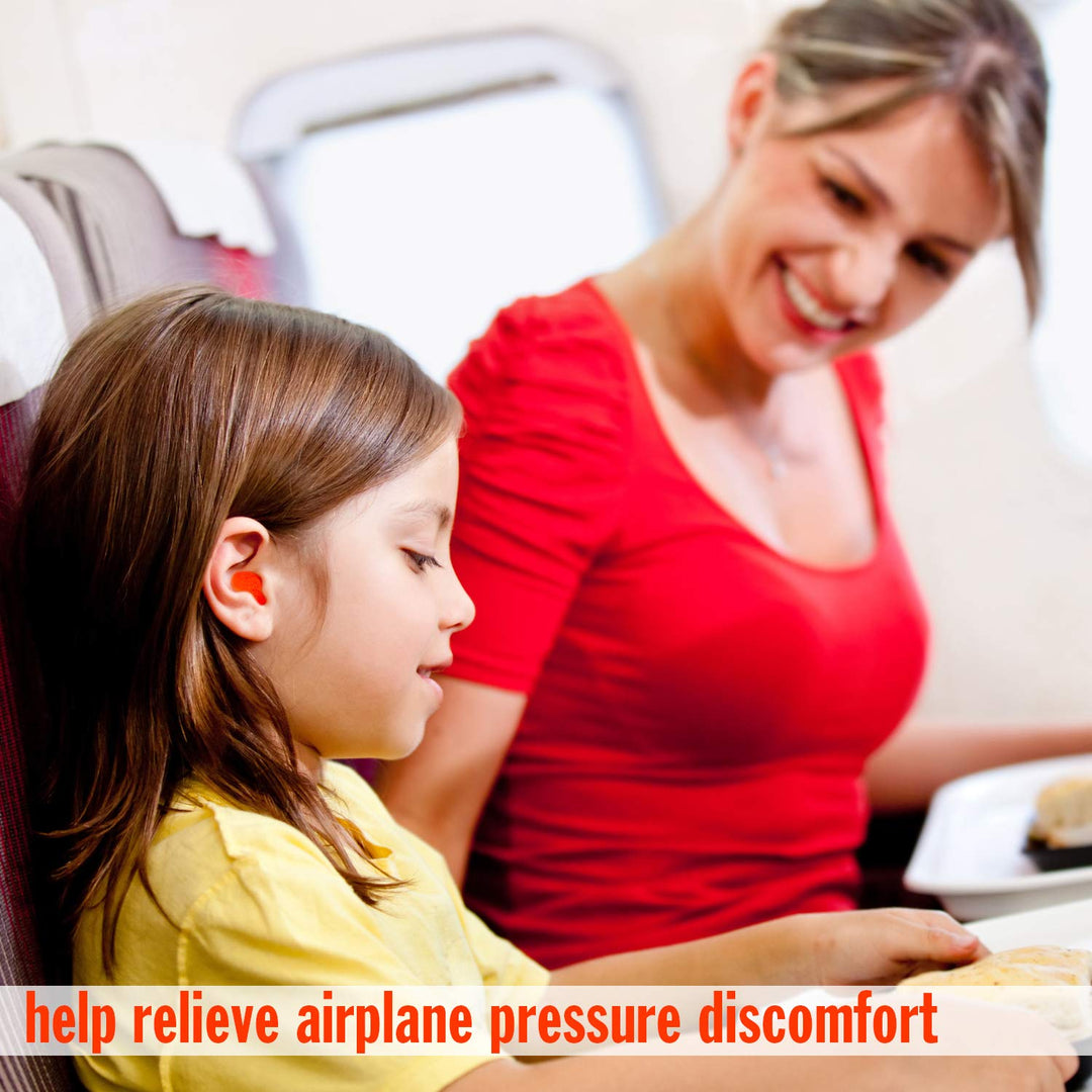 Child wearing Mack's earplugs on airplane with smiling parent, helps relieve discomfort from cabin pressure during flights
