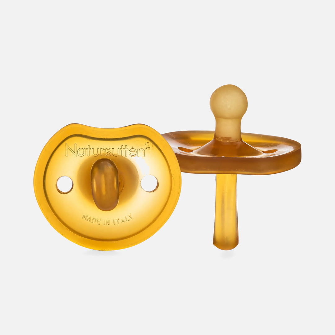 Front and side view of Natursutten butterfly-shaped natural rubber pacifier with rounded nipple, made in Italy