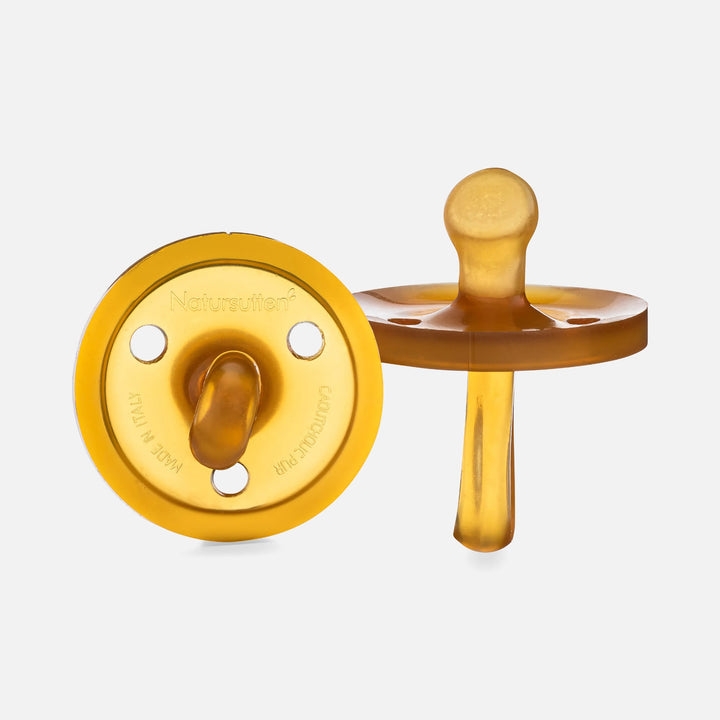 Front and side view of Natursutten orthodontic pacifier made from natural rubber