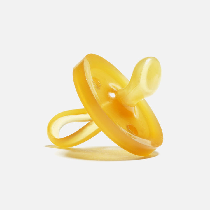 Natursutten Natural Rubber Original Orthodontic baby pacifier in small size, side view of one-piece design