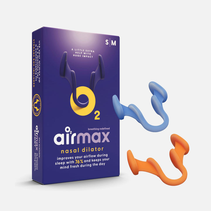 Airmax Nasal Dilator Classic trial pack with packaging and two dilators in blue and orange, enhances airflow by 76% for improved sleep and mental freshness.