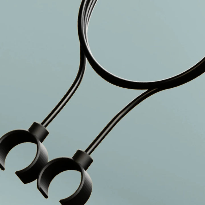 Close-up of Alpine Cord clip ends designed to attach securely to earplugs