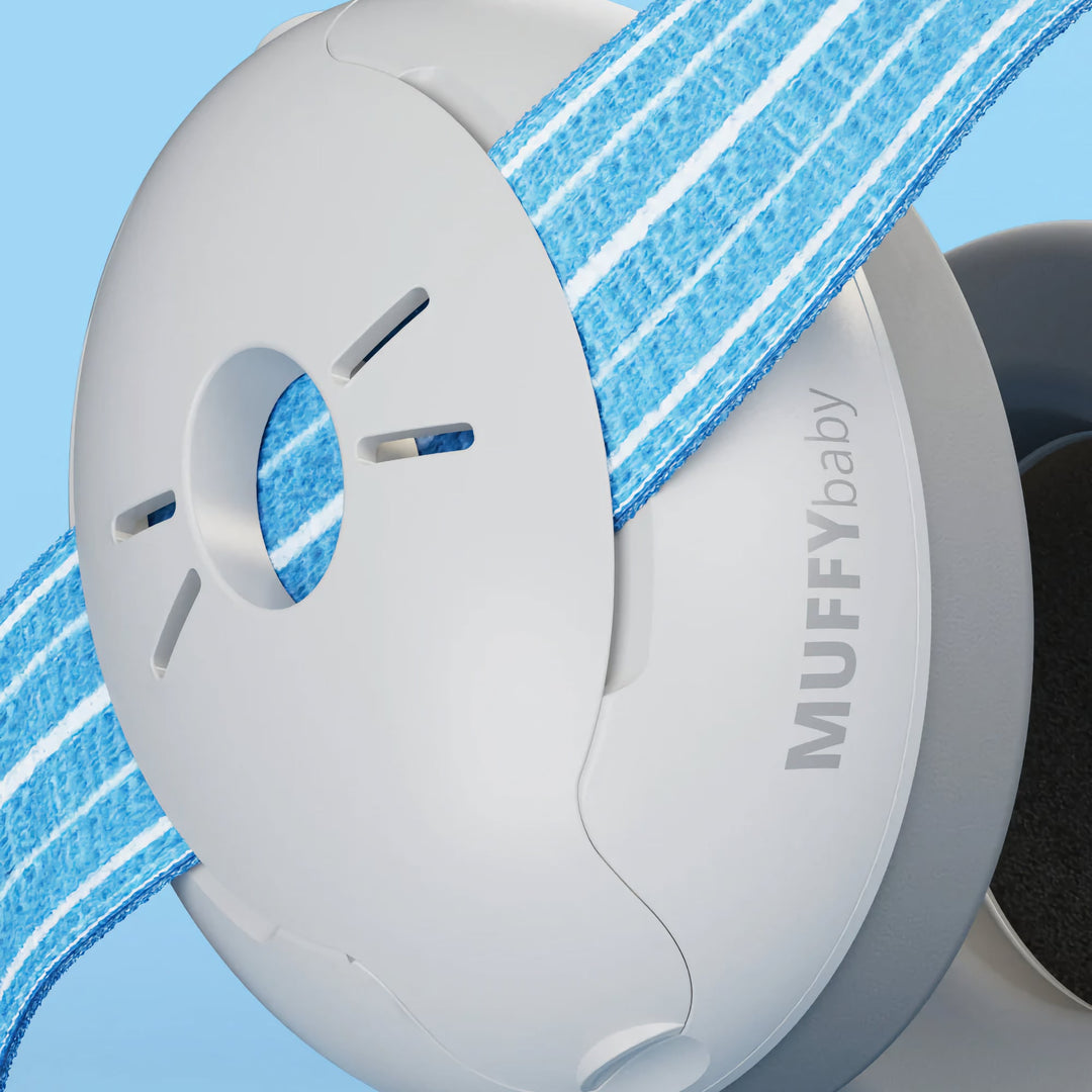 Close-up of Alpine Muffy Baby Earmuffs in blue, showing the durable ear cup design and adjustable non-slip headband for comfortable infant hearing protection.