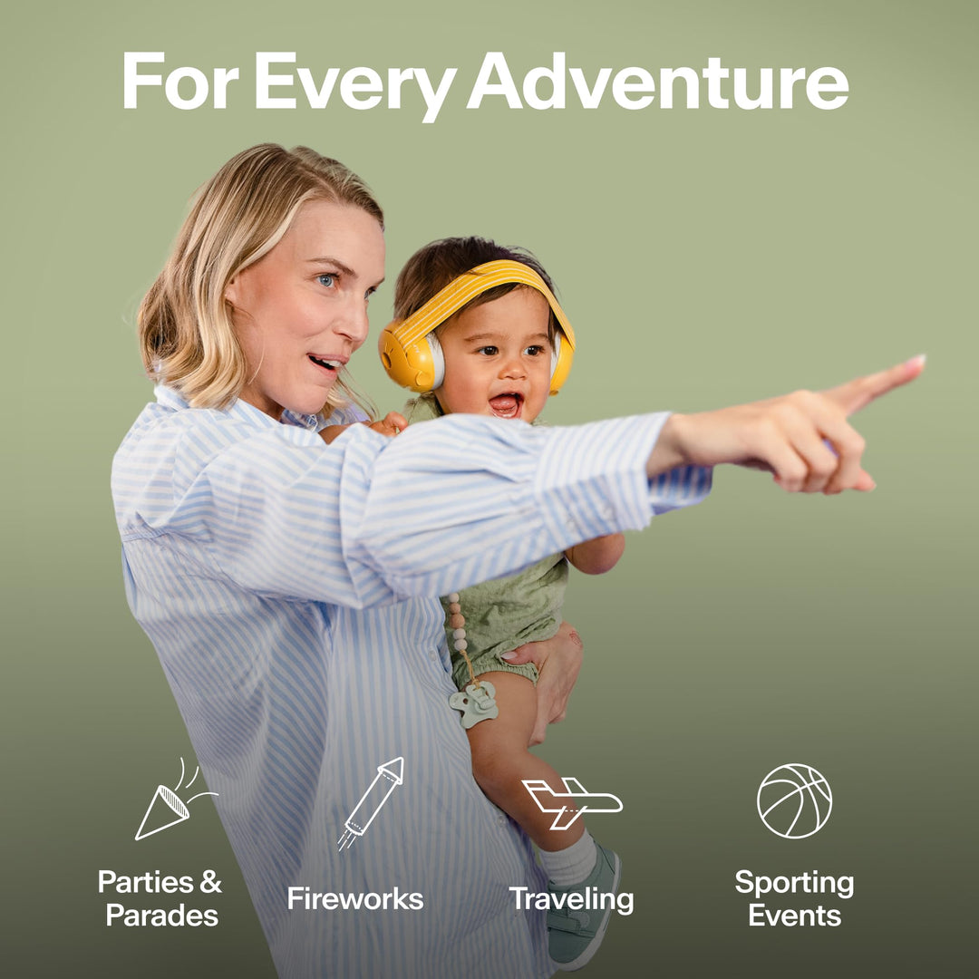 Adult holding child wearing Alpine Muffy Baby Classic earmuffs for family adventures
