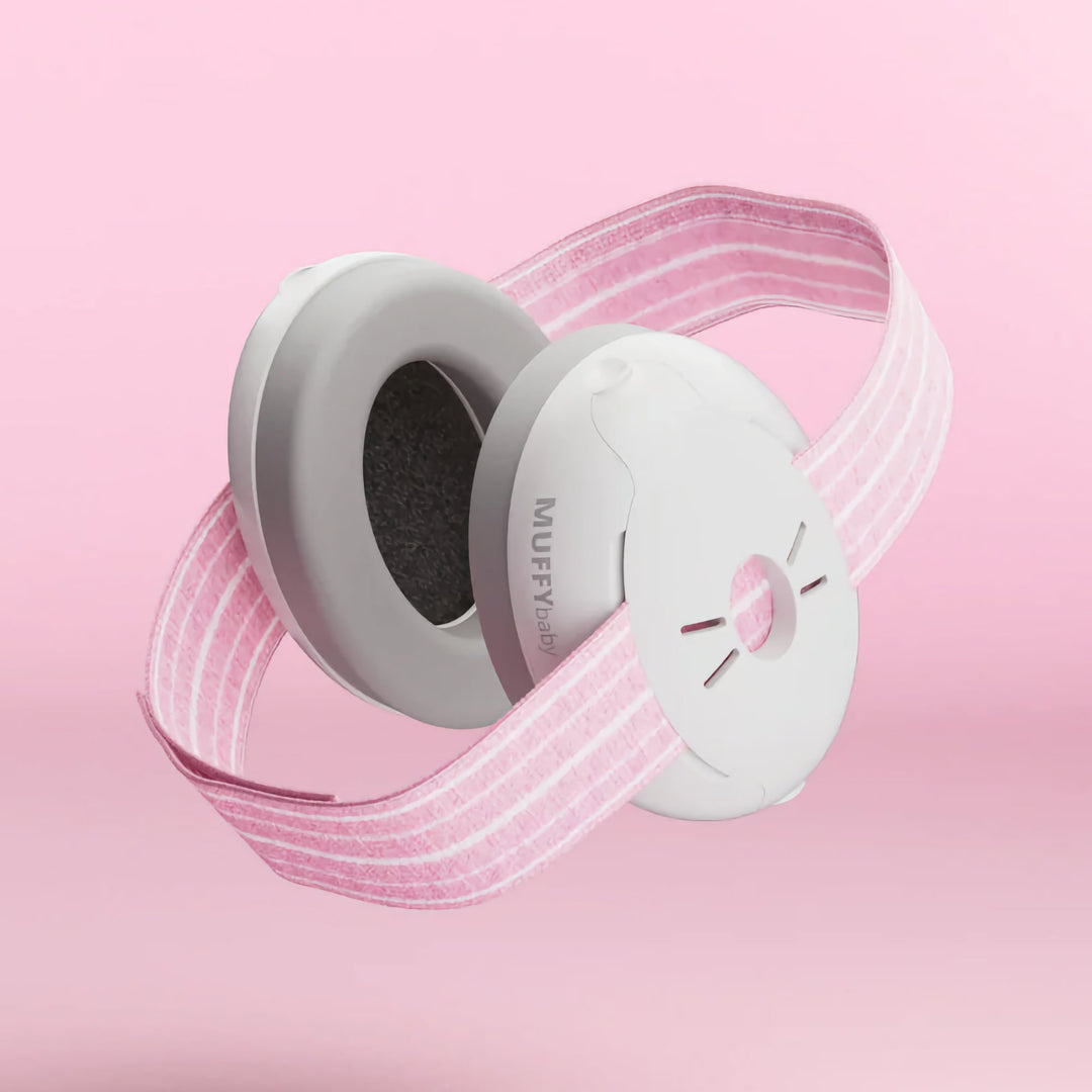 Alpine Muffy Baby Earmuffs in pink, featuring soft ear cushions and an adjustable non-slip headband for infant hearing protection.