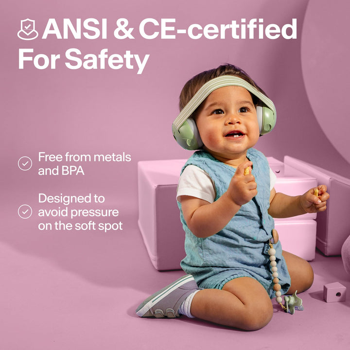 Toddler wearing Alpine Muffy Baby Classic earmuffs with ANSI and CE safety certification information