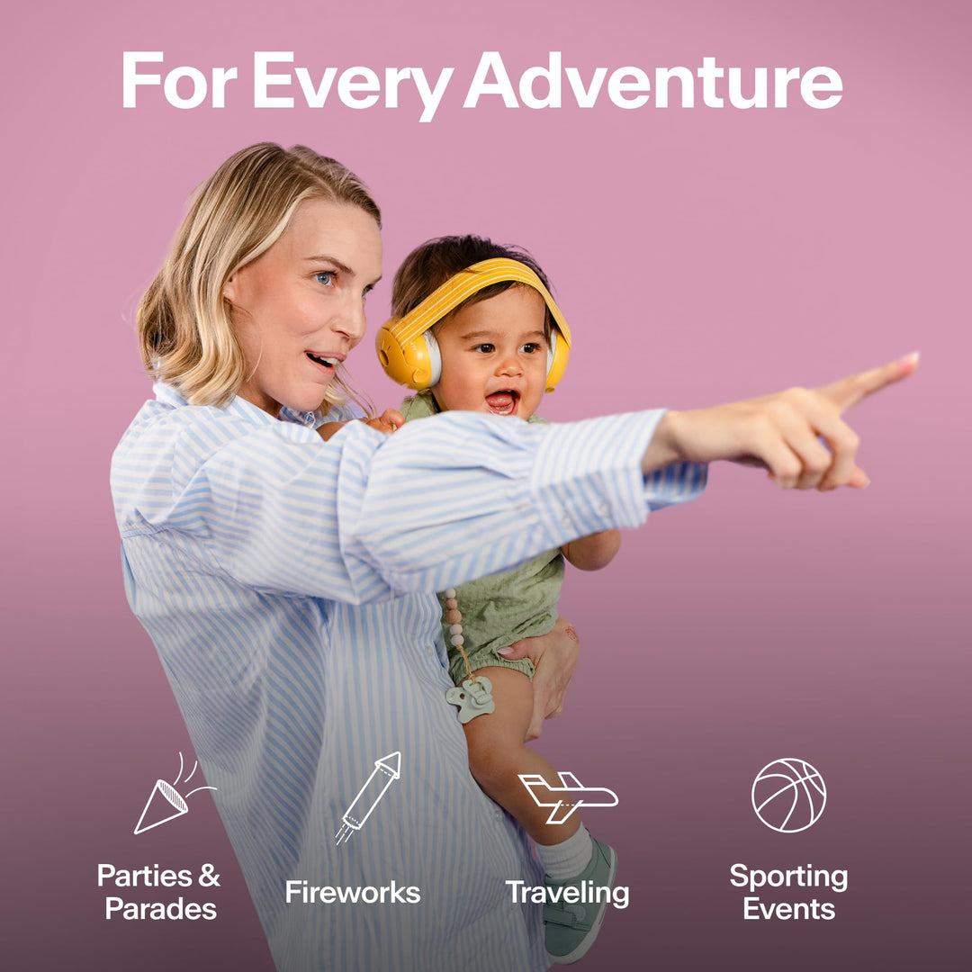 Adult holding child wearing Alpine Muffy Baby Classic earmuffs for family adventures