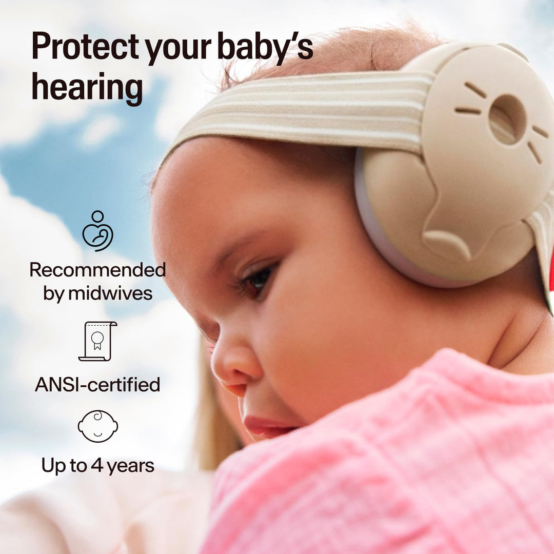 Baby wearing Alpine Muffy Baby Classic Sand earmuffs with striped headband, suitable up to 4 years