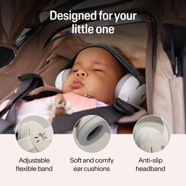 Baby sleeping in stroller wearing Alpine Muffy Baby Classic Sand earmuffs with adjustable headband