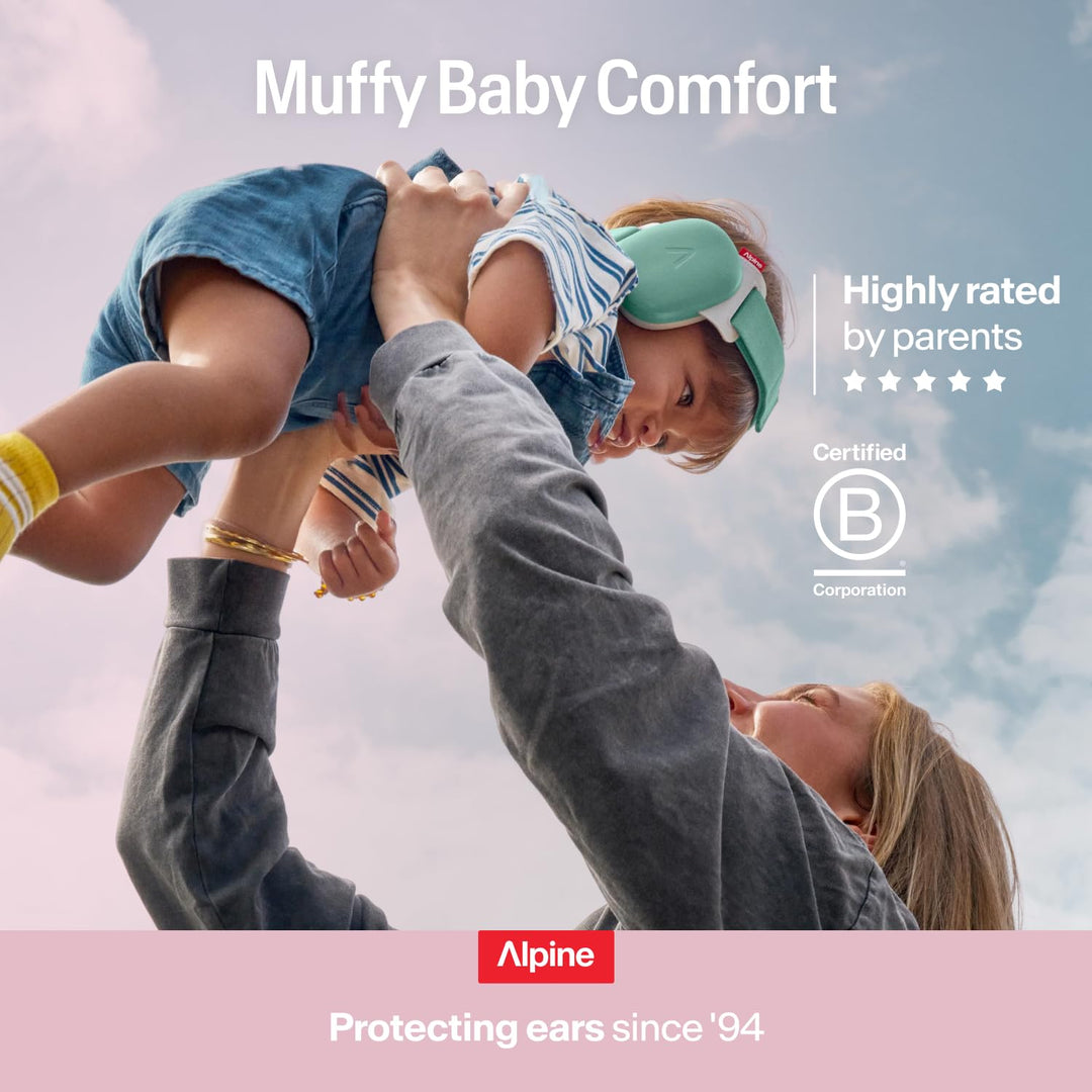 Parent lifting baby wearing Alpine Muffy Baby Comfort earmuffs showing comfortable infant hearing protection highly rated by parents