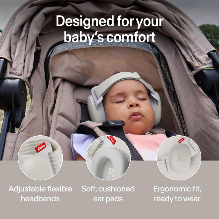 Sleeping baby wearing Alpine Muffy Baby Comfort earmuffs Soft Sand with soft headband for comfortable infant hearing protection