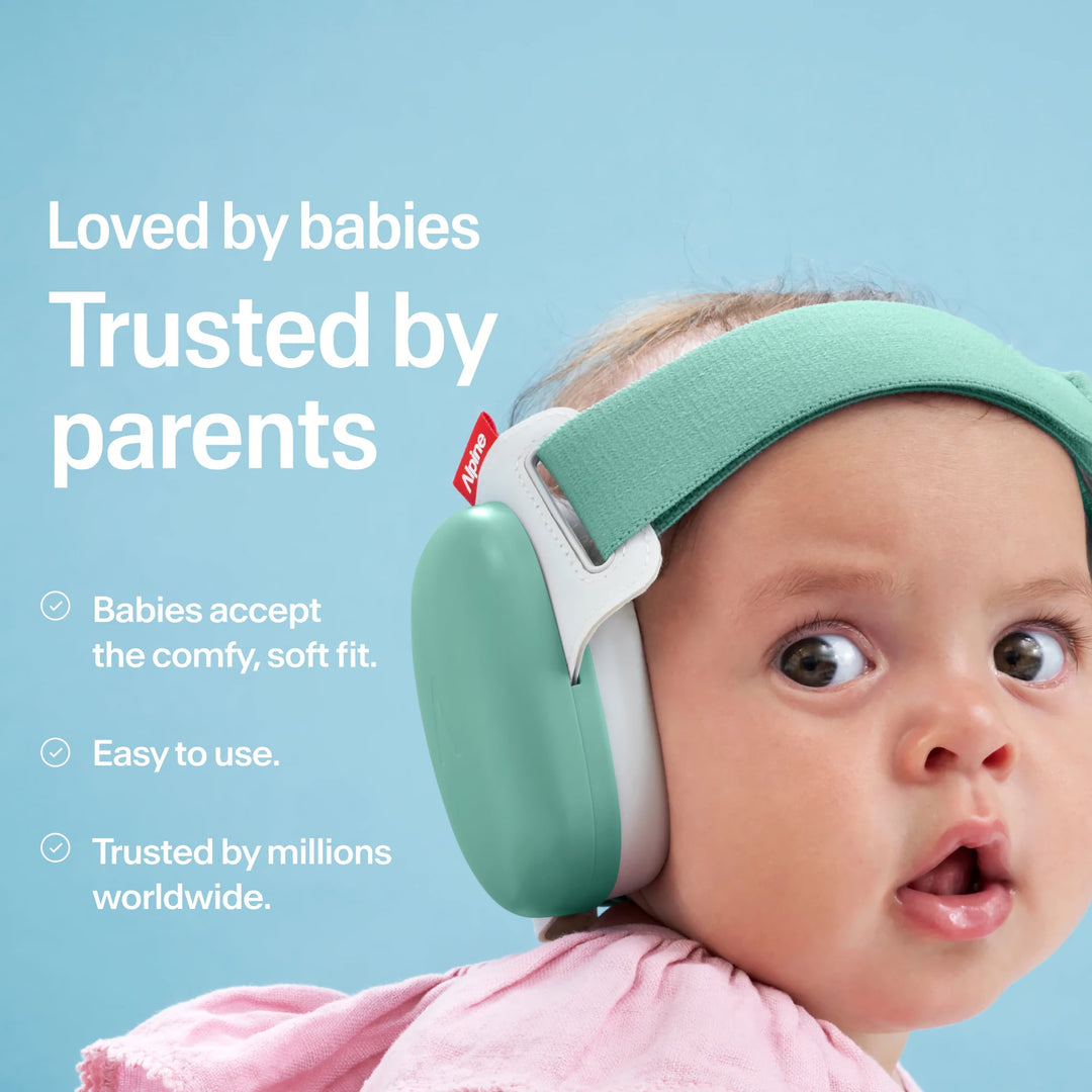 Baby wearing Alpine Muffy Baby sage green earmuffs with soft fit, easy to use, trusted hearing protection for infants worldwide