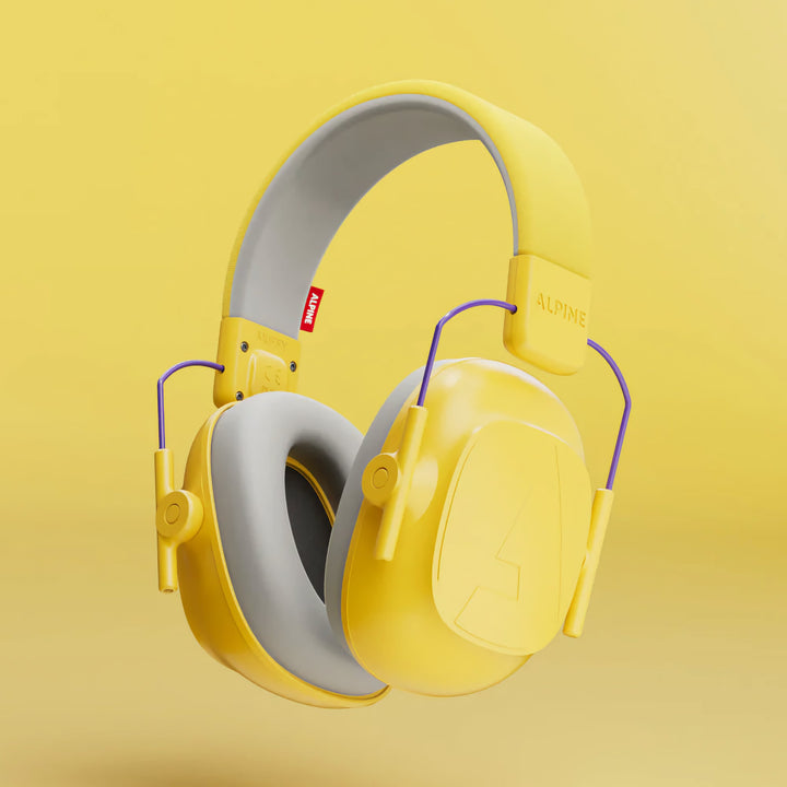 Close-up of Alpine Muffy Kids Earmuffs in yellow, designed with a soft adjustable headband and cushioned ear pads for effective noise protection and comfort for children aged 5–16.