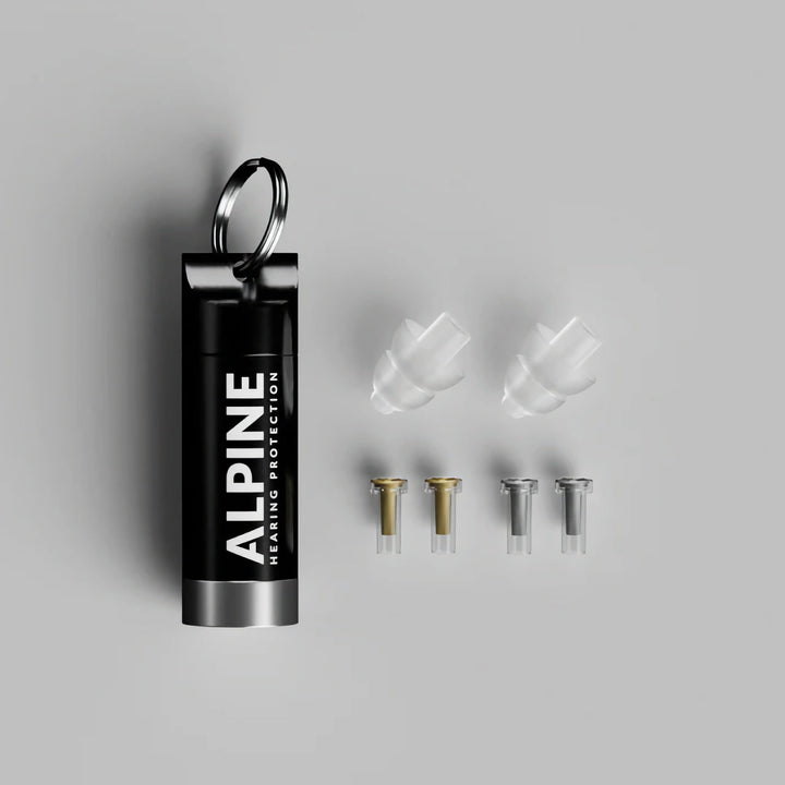 Alpine MusicSafe earplugs set with interchangeable noise filters and a keychain storage case for musicians' hearing protection.