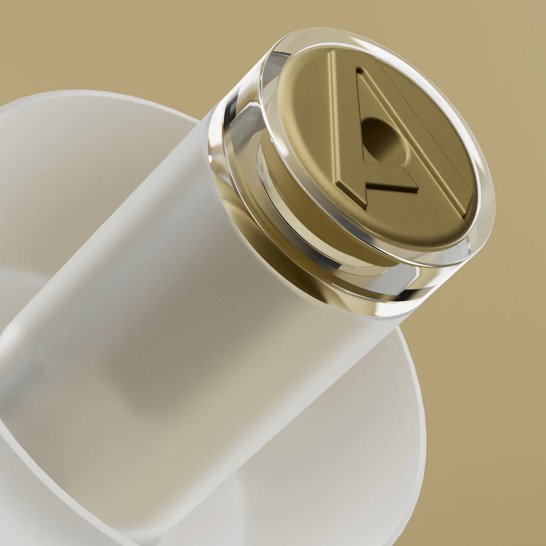 Extreme close-up of Alpine MusicSafe Pro earplug gold filter, designed for safe music listening with clear sound protection