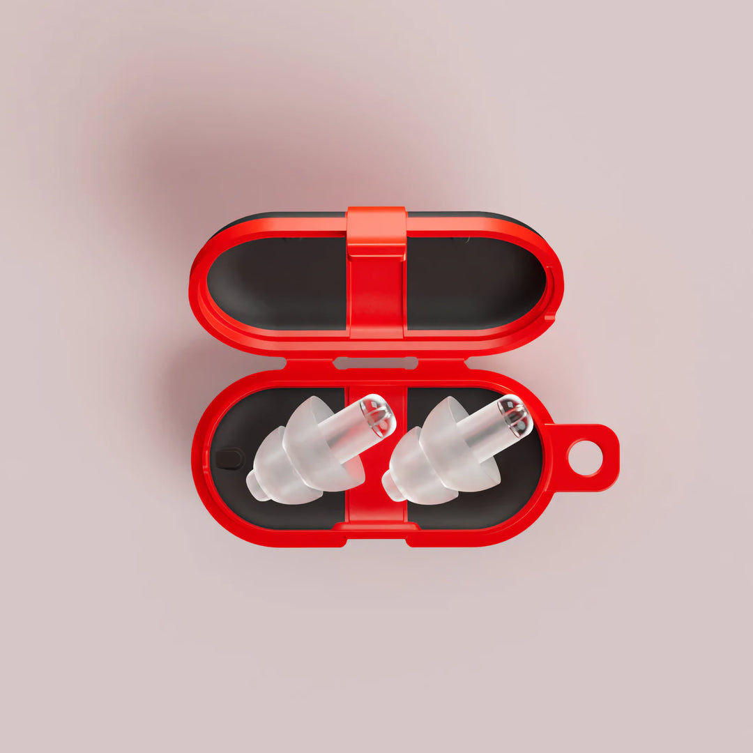 Alpine PartyPlug Earplugs in a red travel case, featuring reusable noise-filtering design for concerts, festivals, and nightlife.