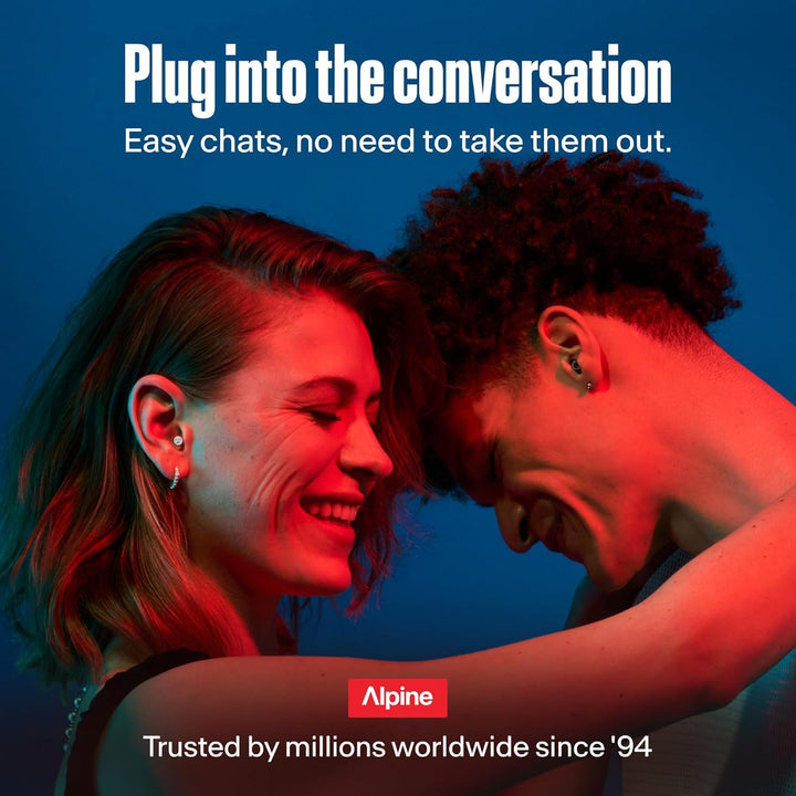 Alpine PartyPlug Pro earplugs worn by two people chatting in a colorful music setting