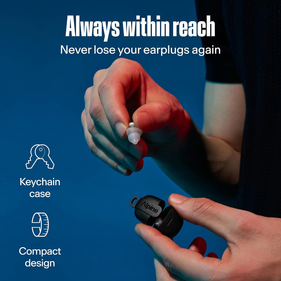Alpine PartyPlug Pro transparent earplug shown with its compact black keychain carry case held in hand
