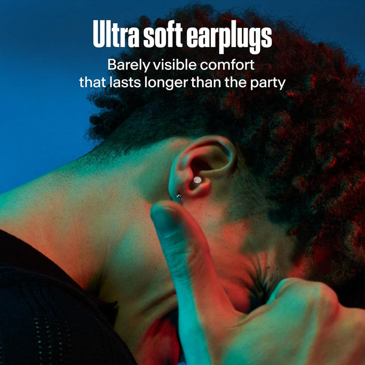 Alpine PartyPlug Pro transparent earplug worn in a close-up view, highlighting its discreet in-ear fit