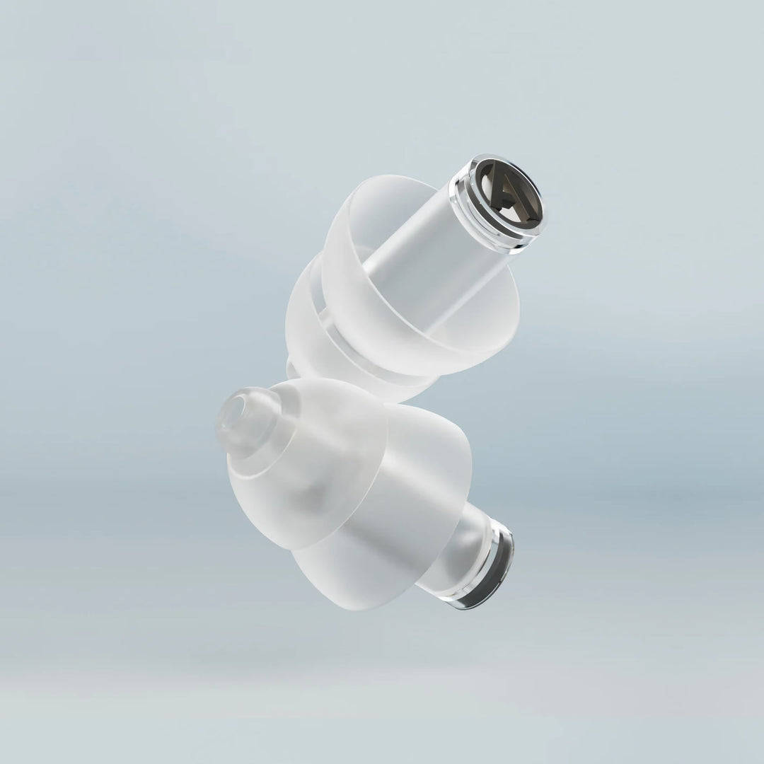 Close-up of Alpine PartyPlug Pro Natural earplugs with advanced acoustic filters for high-fidelity sound and hearing protection.