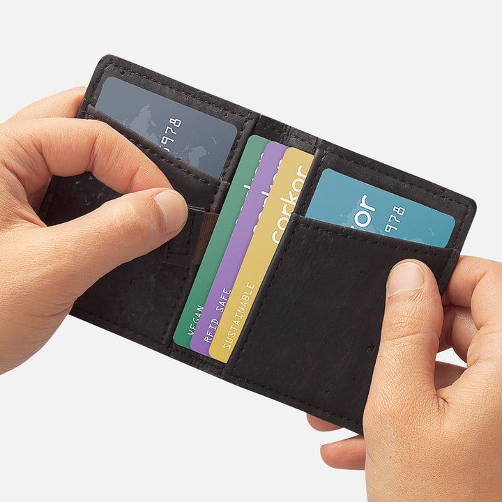 Black Corkor Vegan Cork Wallet with pull-tab design, showcasing card slots and RFID blocking for secure and eco-friendly use.