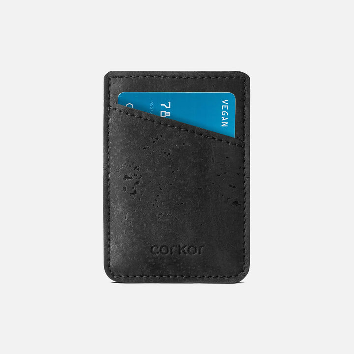 Front view of Corkor CK241 black vegan cork card sleeve wallet, featuring a minimalist design with a debossed logo and eco-friendly cork material for sustainable card storage.