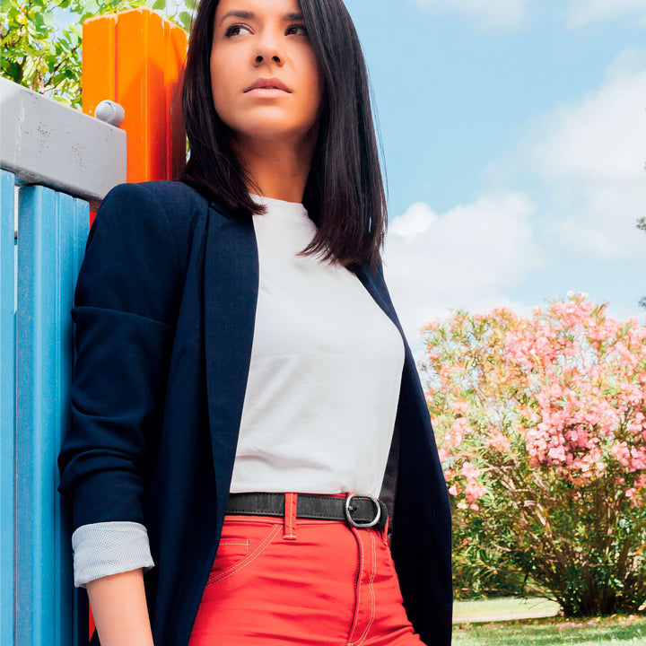 Woman wearing a black Corkor vegan cork belt with a casual outfit.