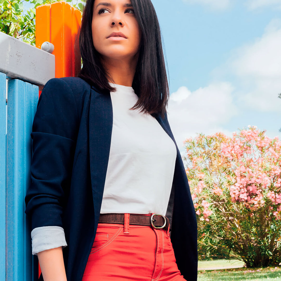 Woman wearing a dark brown Corkor vegan cork belt with a casual outfit.