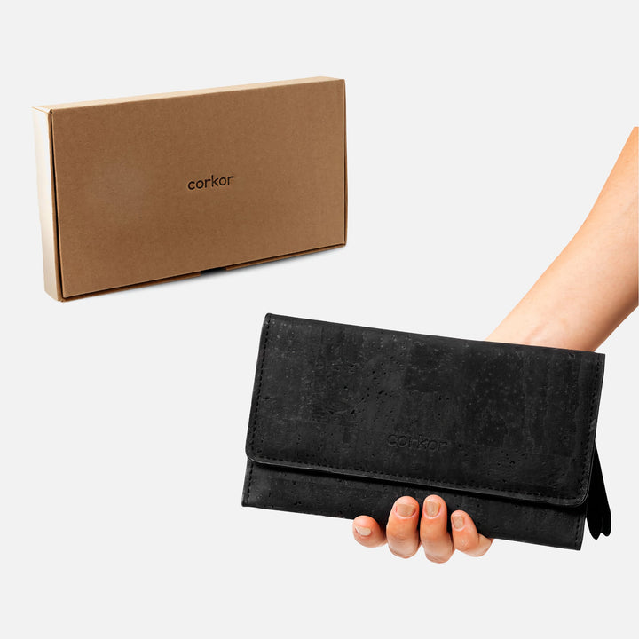 Corkor Vegan Cork Women's Slim Wallet in black with eco-friendly packaging, highlighting sustainability and thoughtful design.