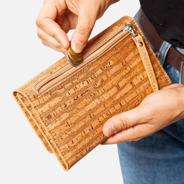 Corkor Vegan Cork Women's Slim Wallet in zebra cork pattern, showcasing the zippered pocket for secure coin storage.