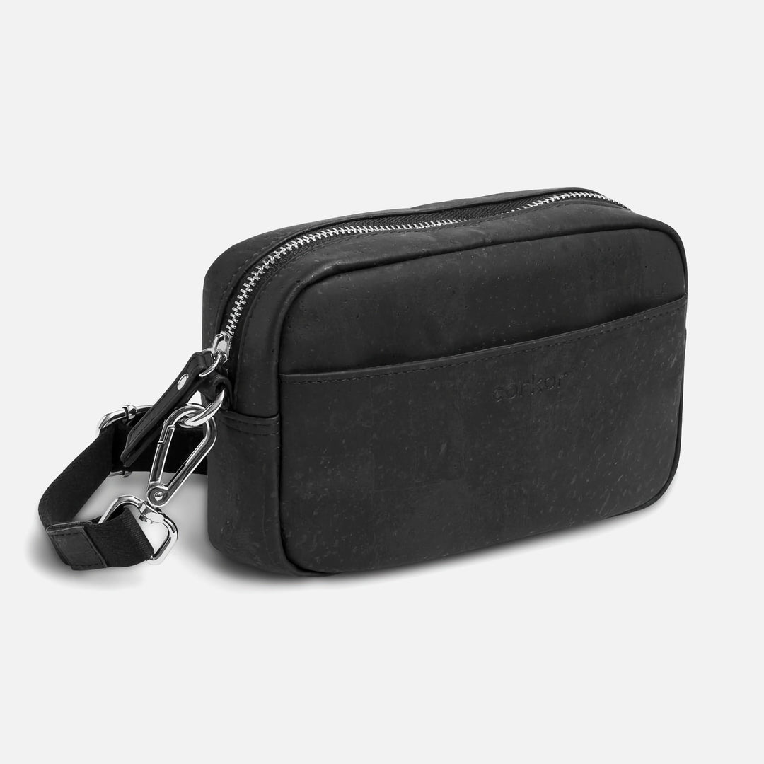 Corkor Vegan Cork Crossbody Pouch Horizontal in black cork leather with front pocket, zipper closure, and adjustable strap hardware