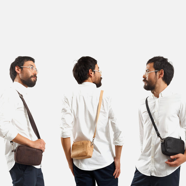Male model wearing Corkor Vegan Cork Crossbody Pouch Horizontal in multiple colors showing adjustable crossbody carry