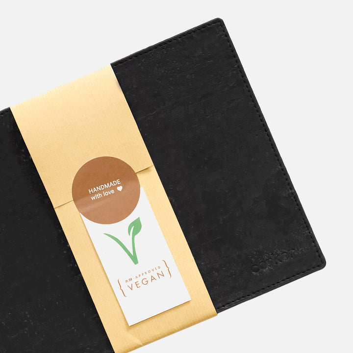 Corkor black mouse pad with paper wrap, handmade label, vegan tag, stitched edges, and embossed logo