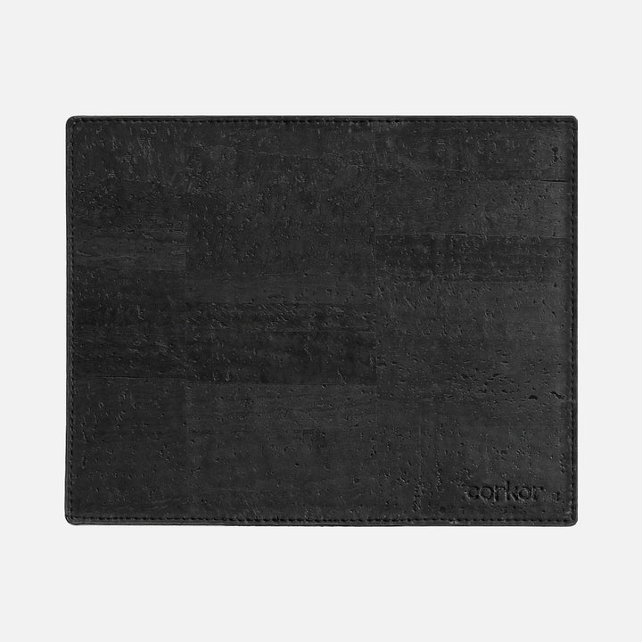 Corkor black mouse pad with stitched edges and embossed logo, shown flat from above