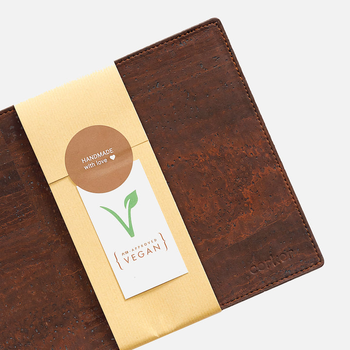 Corkor dark brown mouse pad with paper wrap, handmade label, vegan tag, stitched edges, and embossed logo