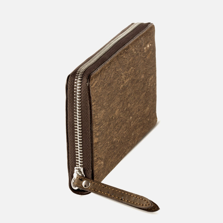 Side view of Corkor Vegan Cork Women's Long Wallet in trunk finish, highlighting its durable zip-around closure and eco-friendly material.