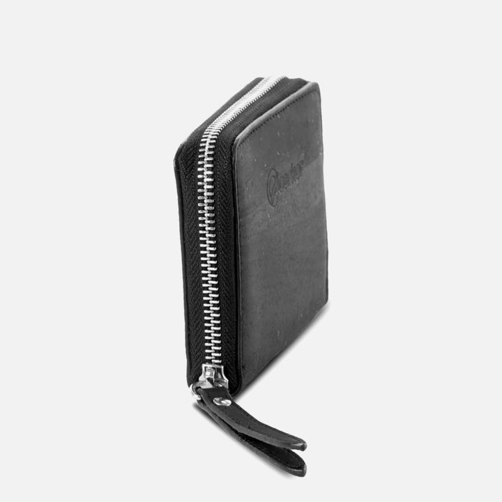 Corkor black square wallet side view with zip-around closure and stitched pull tabs