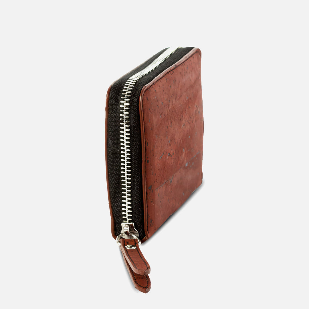 Corkor red square wallet side view with zip-around closure and stitched pull tabs